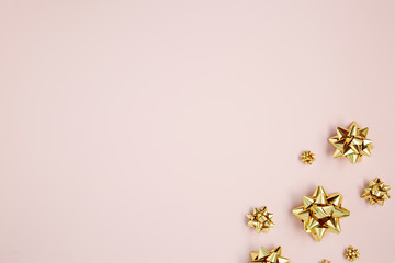 gold ribbon in pink background