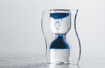 Close up hourglass on table