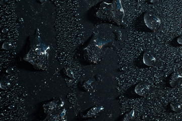 icy water drops, ice crystals, condensation, on a black background