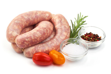 Spiral Sausages, Raw Munich Sausages with herbs and spices, isolated on a white background. Close-up