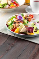 Chisken breast and mushroom salad with vegetables