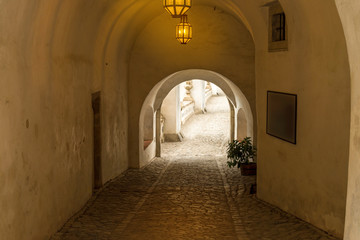 Fototapeta premium The corridor to Cloak Bridge view from IIIrd courtyard inside Cesky Krumlov Castle, Czech