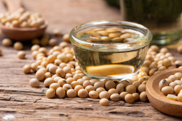 Soy bean and soy oil on  table