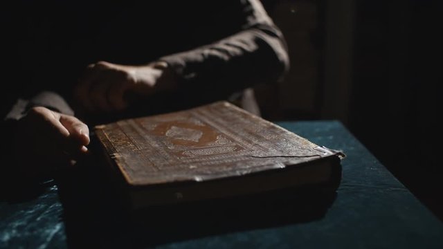 Monk is reading an old book