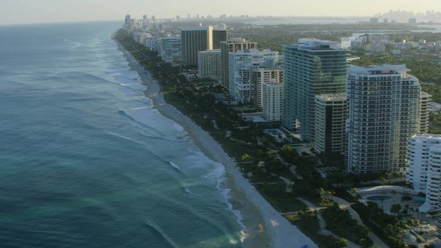 Aerial sunset view of the Ritz Carlton luxury tropical waterfront Condominium resort Bal Harbour Miami Beach Florida USA 
