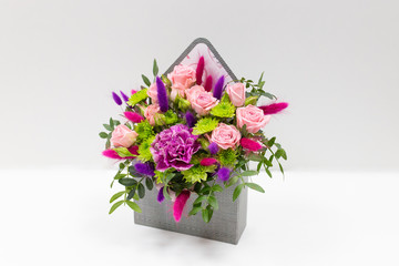 Bright flower arrangement in a gift box (large postal envelope)