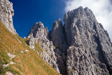 Panoramic view of the towers and spiers of the southern Grigna from the direct route, on a sunny autumn day.