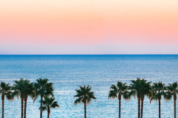 Fototapeta na wymiar Beautiful sunrise at a beach resort. Vacation and holiday background.