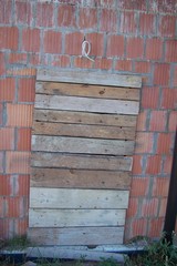 A temporary plank door