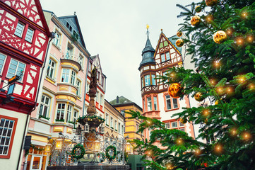 Christmas tree and traditional houses on the Christmas decorated Market square in Bernkastel-Kues,...