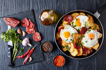 Traditional spanish fried eggs with potatoes