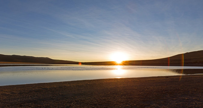 Sunset in Andes. lagoon Huayacota. High Andean landscape in the Andes.