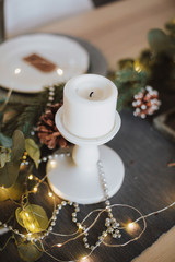 christmas kitchen interior tree decorated by lights gifts toys candles holiday concept