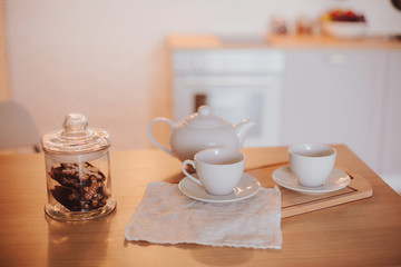 two cups of tea or coffee americano espresso white space background selective focus