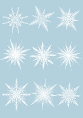 Fototapeta na wymiar illustration of snowlakes on the flat blue background