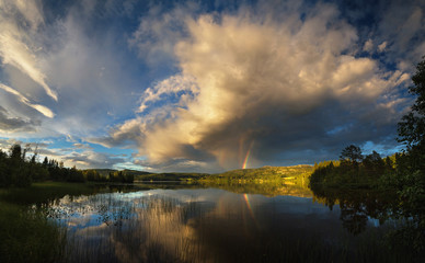 Obraz premium Rainbow above Jonsvatnet lake, Trondheim, Norway