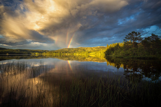 Rainbow above Jonsvatnet lake, Trondheim, Norway