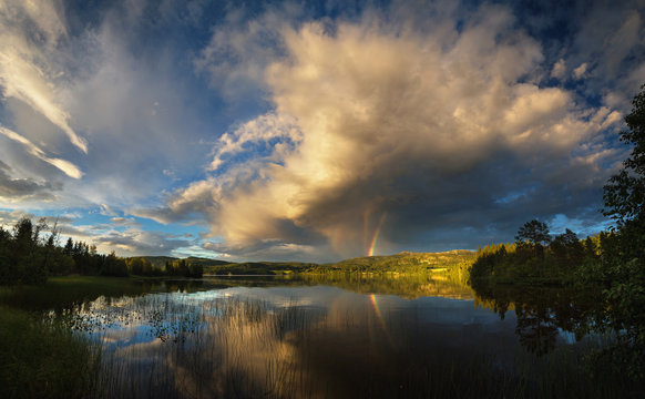 Rainbow above Jonsvatnet lake, Trondheim, Norway
