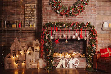 christmas room interior with wood letters new year 2019 decorated by lights gifts toys candles holiday concept