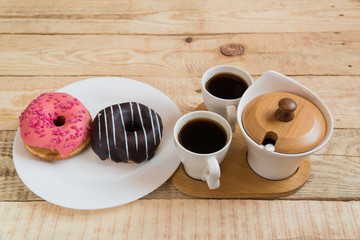 two cups of coffee Cherry Chocolate doughnut donut
