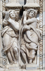 Caryatids on the main facade of the Milan Cathedral, Duomo di Santa Maria Nascente, Milan, Lombardy, Italy