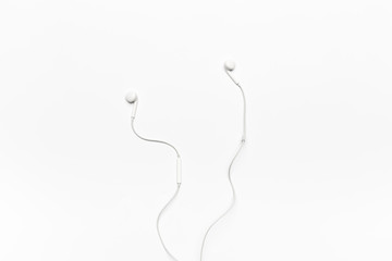 white Earphones isolated on white background