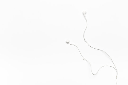 white Earphones isolated on white background