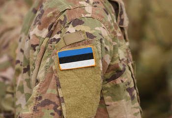 Flag of Estonia on soldiers arm (collage).