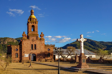 View of the San Francisco Javier de Cerocahui catholic church in the small town of Cerocahui in the Copper Canyon (Barrancas del Cobre) in Chihuahua state, Mexico - obrazy, fototapety, plakaty