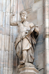 Obraz premium Statue of Saint on the facade of the Milan Cathedral, Duomo di Santa Maria Nascente, Milan, Lombardy, Italy