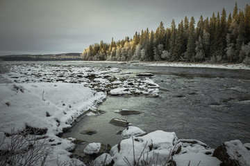 Winter frozen river Tannforsen