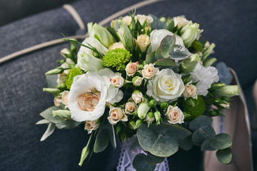 bridal bouquet  lie on a sofa. Wedding acsessories