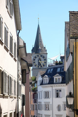 Fototapeta na wymiar Clock tower of the St. Peter evangelical church in Zurich, Switzerland