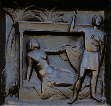 Thou shalt not commit adultery - Joseph and Potiphar's wife, relief on the door of the Grossmunster ("great minster") church in Zurich, Switzerland