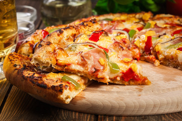 Homemade pizza with bacon, paprika and corn