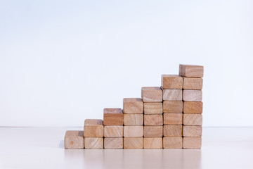 Fototapeta premium Steps on a stairs made of wooden blocks