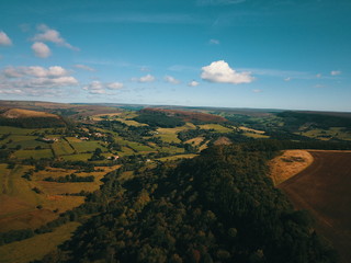 A view from above of the north yorkshire country side showing the green hills and trees