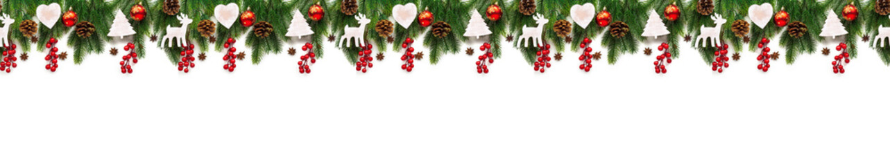 Christmas tree branches on white background as a border
