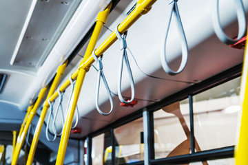 handrails in the cabin of a modern and comfortable city bus or electric bus © OlegDoroshin
