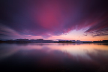 Fototapeta na wymiar Amazing sunset light and colours by the shores of Gjerdavika, Norway.