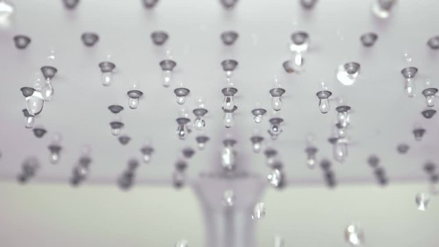 Falling water drops frop shower head