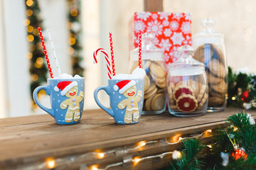 Gingerbread Man with two blue cups - Christmas Holiday breakfast Background