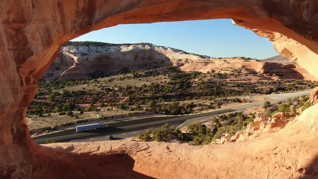 Wilson Arch Flying Through Aerial Shot of Rock Formation Utah USA