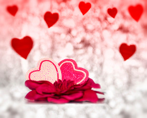 red hearts on pink background. present for valentine's day