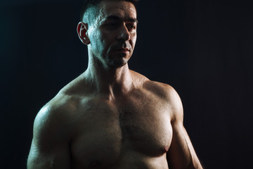 bodybuilder on black background
