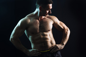 bodybuilder on black background