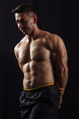 Fototapeta na wymiar bodybuilder on black background