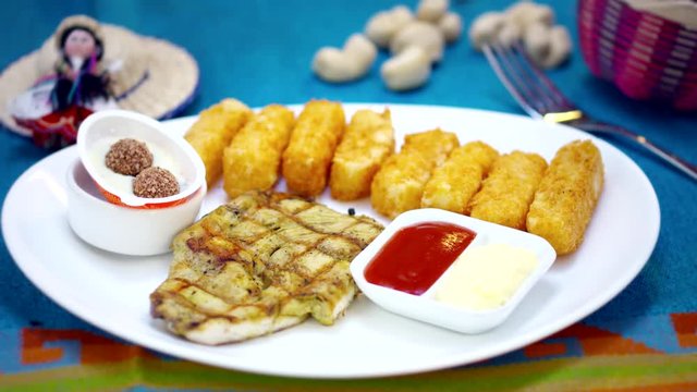 Yucca fried sticks with ketchup and gift