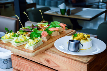 mix food on dinner table, appetizer and dessert.