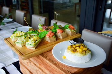 mix food on dinner table, appetizer and dessert.